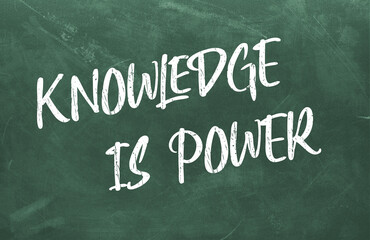 Fototapeta premium Knowledge is Power written on the green chalkboard