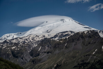 Mount Elbrus and the round cloud in summer