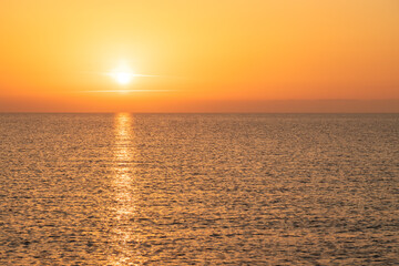 Sun rise at the beach. Sun rising at sea horizon. Golden hour.