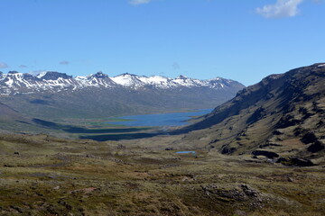 Snowy peaks of basaltic mountains in the area of the eastern fjords in Iceland