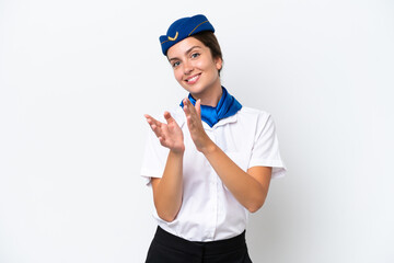 Airplane stewardess caucasian woman isolated on white background applauding after presentation in a conference