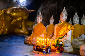 Wat Ao Noi buddha statues in the cave in Prachuap Khiri Khan, Thailand