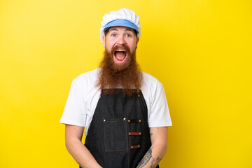 Fishmonger wearing an apron isolated on yellow background with surprise facial expression