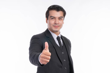 Portrait working Asian business handsome man ware suit giving a thumb up hand on white background with copy space - business concept