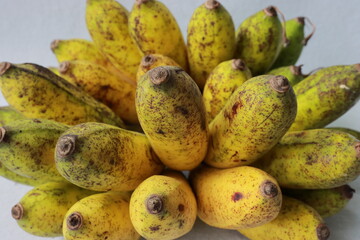 Bunch of Yellow Banana fruits isolated on white background