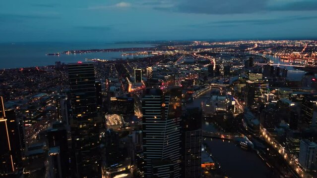 Beautiful aerial drone view of Melbourne City, Victoria, Australia looking over Yarra River in the very early morning at dawn 