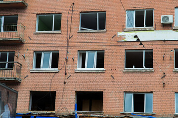 Broken windows and destroyed facade