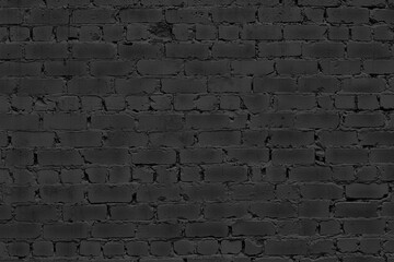 Old rough black brick wall texture. Dark aged brickwork masonry. Abstract gloomy grunge textured background