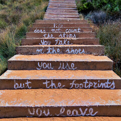 Beautiful quote written on a flight of steps at a beach in Malta - 513119367