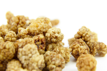 Dried mulberry on white background. Dry sweet berries morus alba