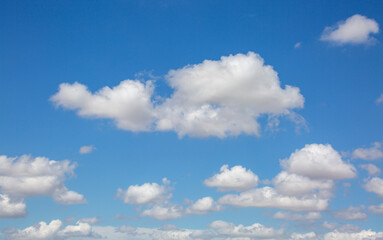 Naklejka na ściany i meble natural phenomenon blue sky with white clouds