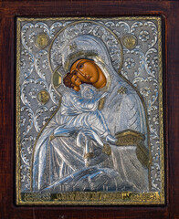 traditional orthodox icon of Mother Mary, Icon of Madonna,  Jesus, church faith concept, prayer, of Holy Mary of Magdalene, bizantine, gold background, Greece. wood table - obrazy, fototapety, plakaty