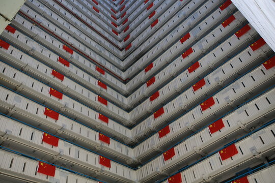 flags for celebrate the 25th anniversary of the establishment of the Hong Kong Special Administrative in Ping Shek Estate, Hong Kong