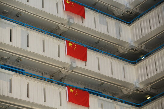 flags for celebrate the 25th anniversary of the establishment of the Hong Kong Special Administrative in Ping Shek Estate, Hong Kong
