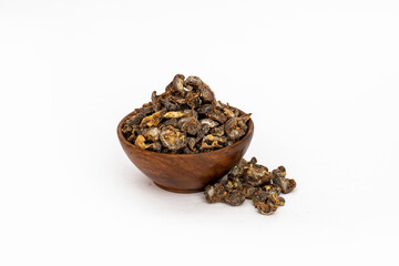 amla seedless or Phyllantus emblica L in wooden bowl 