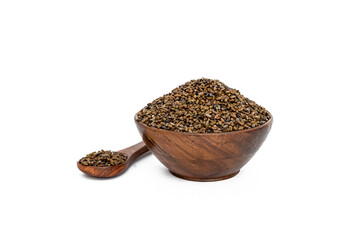 Indigofera or indigo seeds in wooden bowl

