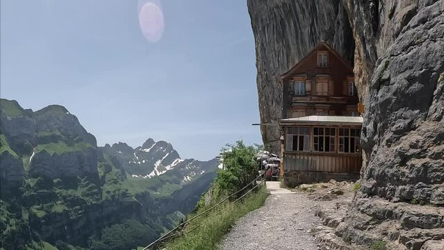 Ebenalp is a famous tourist destination in the canton of Appenzell in Switzerland. The famous mountain lodge in the middle of the hiking trail, Aescher Wildkichi