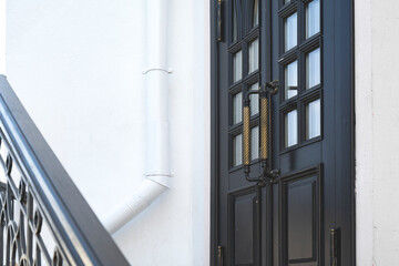 old wooden entrance door with antique door handle