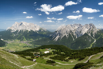 View from cable car Grubigstein Grubig II of Mountain Zugspitze, Sonnenspitze and valley with...