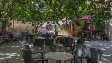Quiet street view in the small mountainous town of Kalavrita in the east-central part of Achaea region, Peloponnes peninsula, West Greece, Greece.