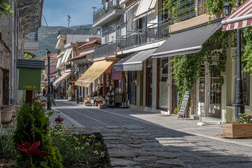  Quiet street view in the small mountainous town of Kalavrita, located in the east-central part of Achaea region, Peloponnes peninsula, West Greece, Greece.