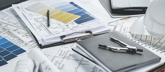 Architects concept, engineer architect designer freelance work on start-up project drawing, construction plan. architect design working drawing sketch plans blueprints and making construction model