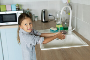 girl washing her hands