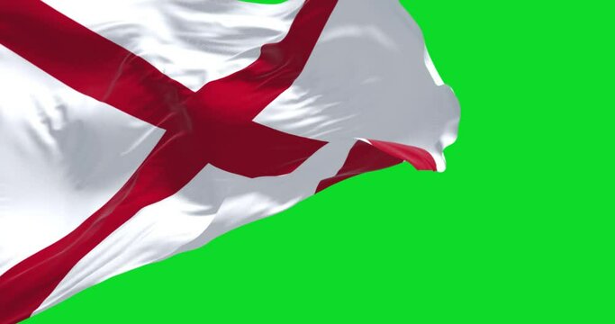 The state flag of Alabama waving in the wind