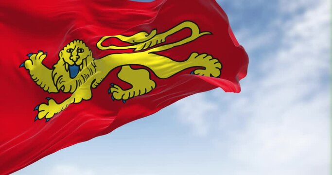 Rear view of the Aquitaine flag waving in the wind on a clear day