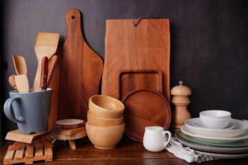 Kitchen  accessories and utensils on an old wooden table.