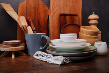 Kitchen  accessories and utensils on an old wooden table.
