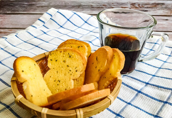 Bread, Milk, Butter, and Tea - A Delicious and Healthy Meal with Freshly Cooked Chicken, Grilled Vegetables, and Roasted Potatoes on a White Plate