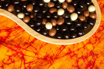 Chocolate covered hazelnuts.  Chocolate balls