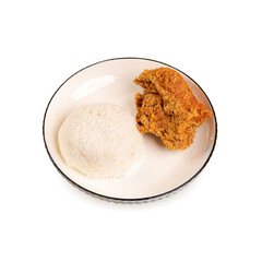 Delicious fried chicken with crispy skin and rice on bowl