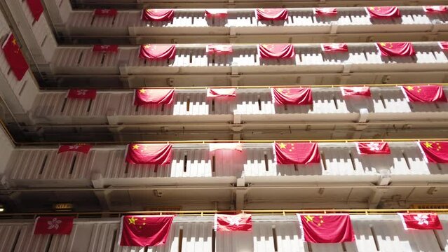 flags for celebrate the 25th anniversary of the establishment of the Hong Kong Special Administrative in Ping Shek Estate, Hong Kong