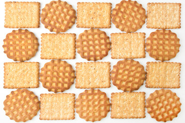 Healthy and delicious cookies and crackers. Oats and wheat on the background. copy space frame for recipes with spikelets