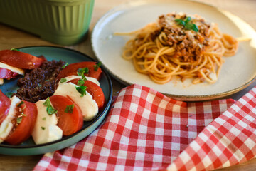Spaghetti Bolognese with Caprese Salad
