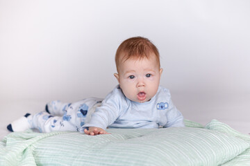 baby lying on side in studio