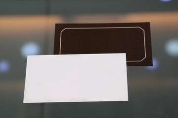 There are white and black business cards.