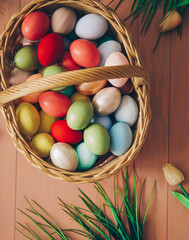 easter eggs in basket. Easter basket. Eggs. Spring time. Happy day. Wooden table. 