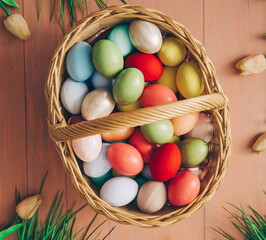 easter eggs in a basket. Easter concept. Eggs. Holidays. Wooden table. 