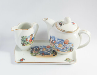 Vintage porcelain coffee set with cartoon scenes
