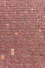 Red granite pavement. Red square granite pavement