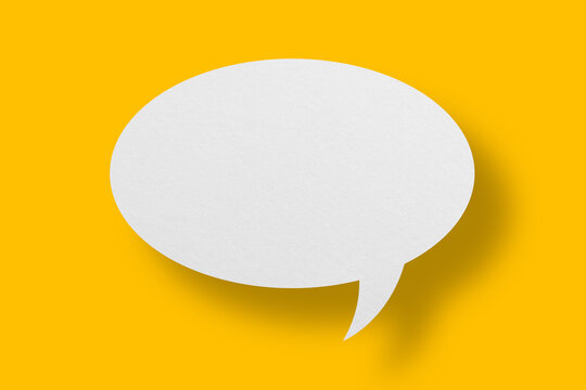 White paper in speech bubble shape set against yellow background.