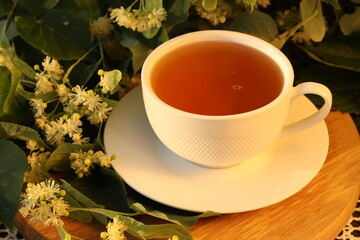 cup of herbal tea with beautiful linden blossom
