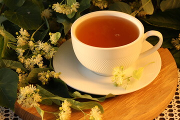 cup of herbal tea with beautiful linden blossom