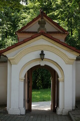 Fototapeta na wymiar Archway from the courtyard of the Franciscan monastery. Wieliczka, Poland.