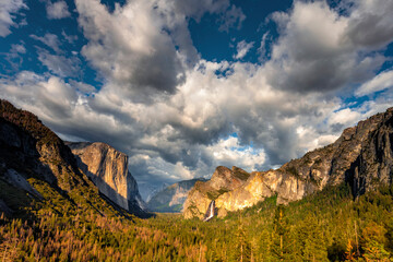 Evening view from the Tunnel View overlook in Yosemite National Park.  Seen are the icons of the park - El Capitan, Half Dome and Bridalveil Falls