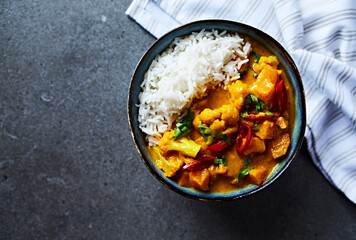 Sweet potato and cauliflower curry made with coconut milk. Top view	
