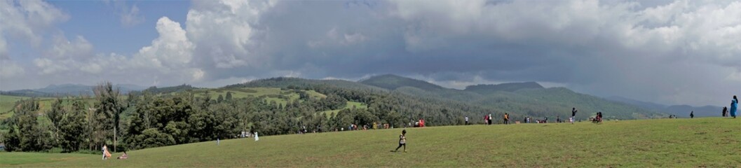 Ooty,Tamilnadu,India-June 04 2022:Tourists enjoying beautiful Wenlock Downs 9th Mile Shooting Point.